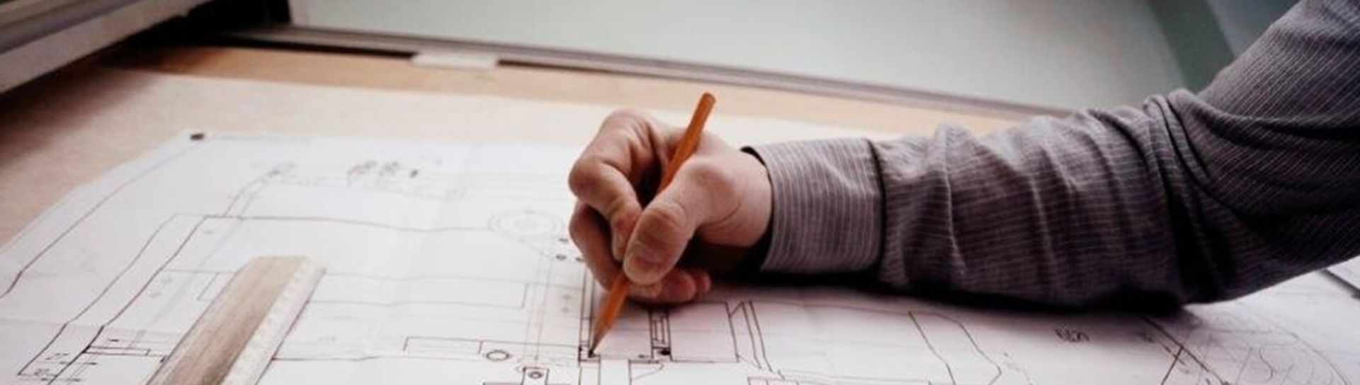 Man at drawing board